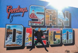 Kevin at the Greetings San Diego mural in North Park